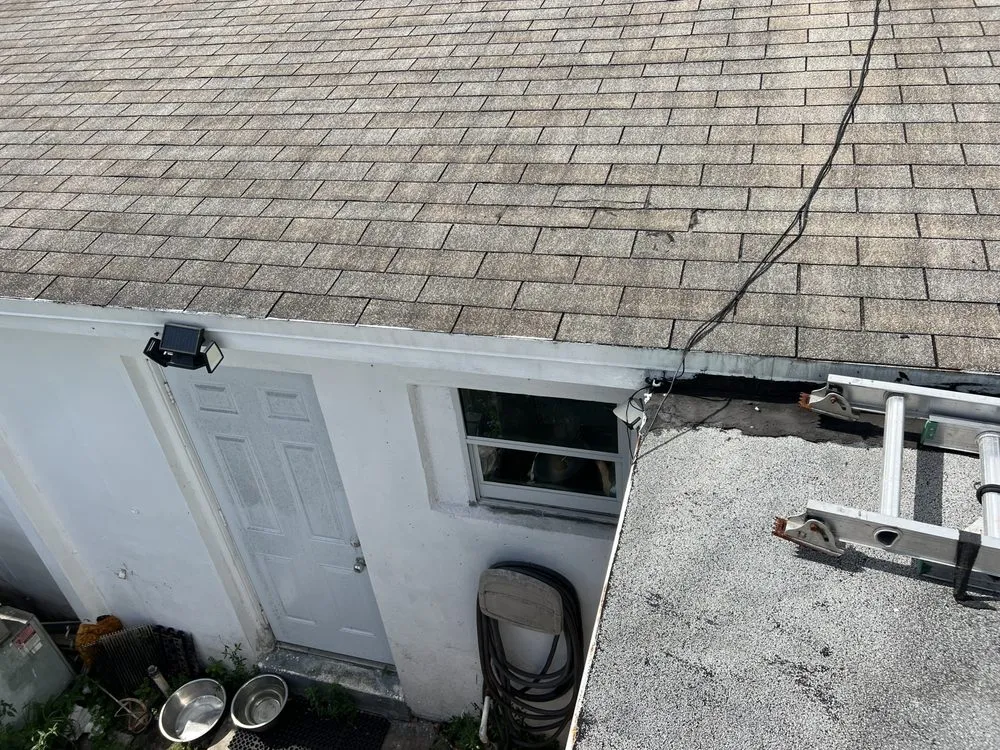 Slide of Combat Roofing Services