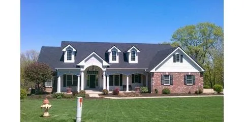 Top-rated storm damage roof repair after storm damage in Ofallon, MO by Comia Home Builders
