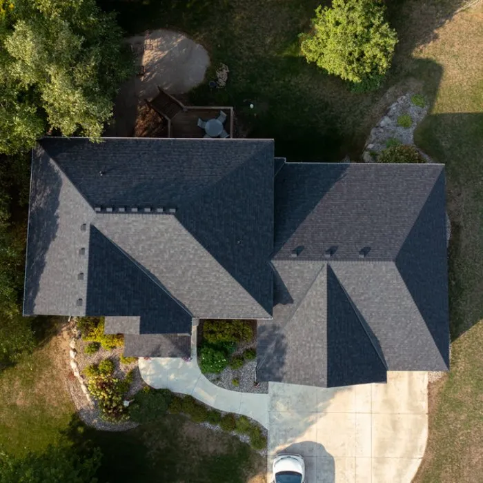 Slide of Comitted 365 Roofing & Exteriors