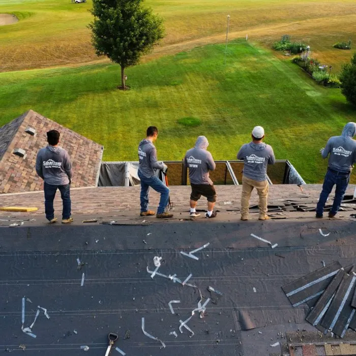 Slide of Comitted 365 Roofing & Exteriors