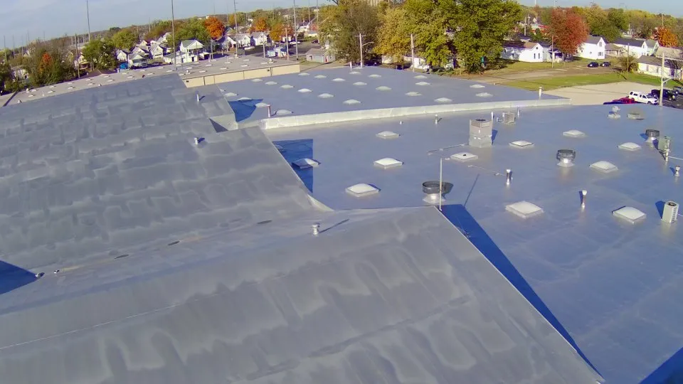 Slide of Commercial Coatings Roofing & Restoration