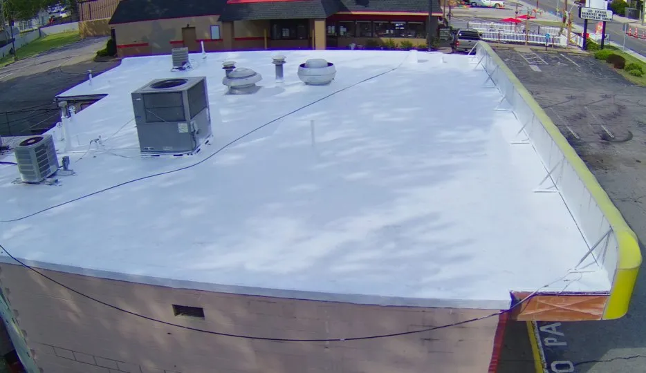 Slide of Commercial Coatings Roofing & Restoration