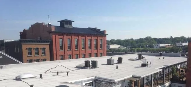 Slide of Commercial Roof USA