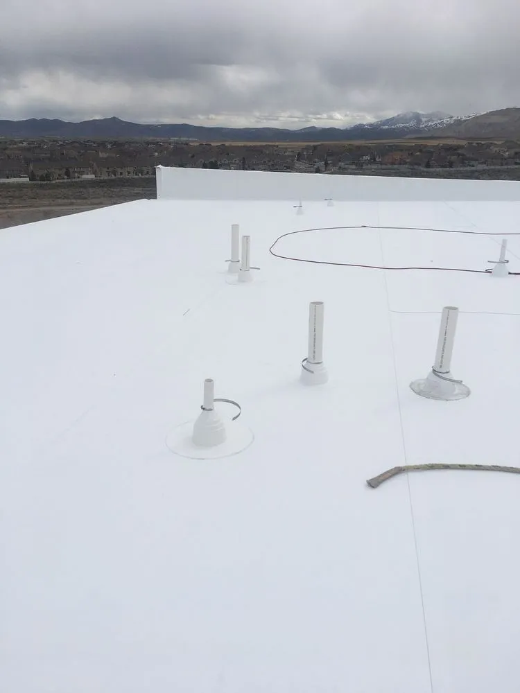 Slide of Commercial Roofing Experts