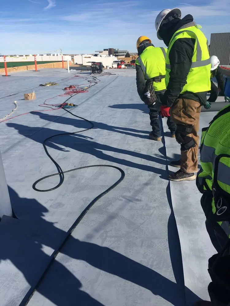 Slide of Commercial Roofing Experts