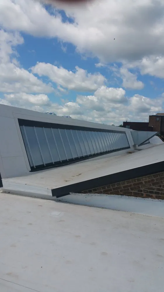 Slide of Commercial Roofing of Wisconsin