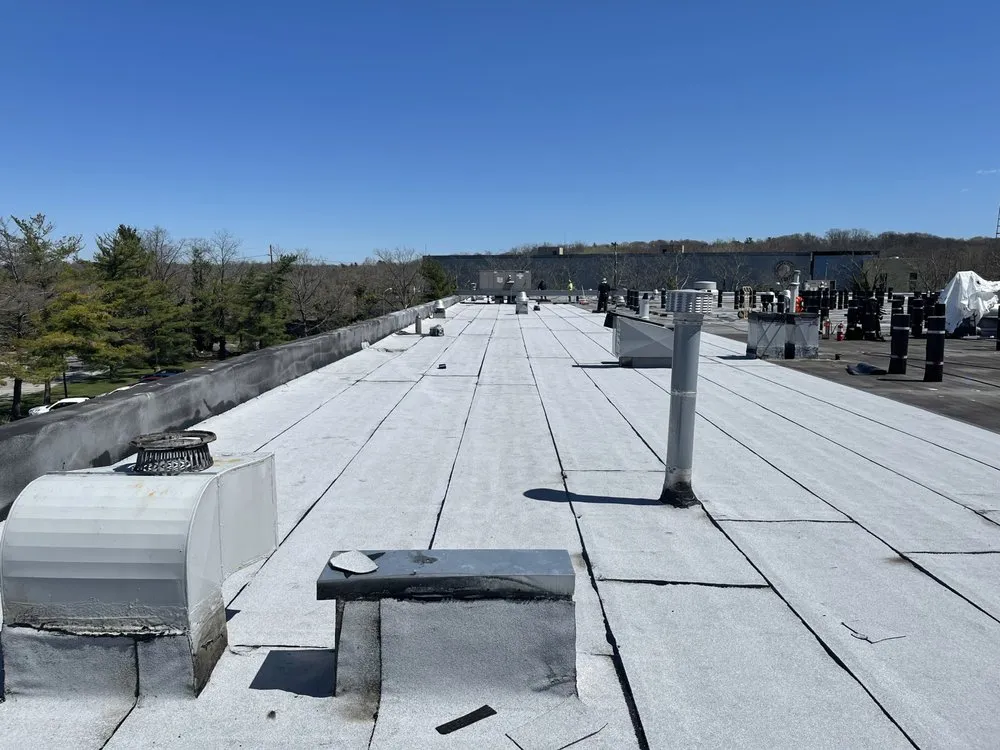 Local shingle roofing service experts serving Amityville, CT - Commercial Roofing Solutions