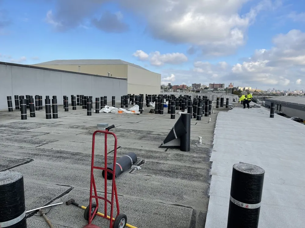 Local storm damage roof repair same-day service in Amityville, CT by Commercial Roofing Solutions