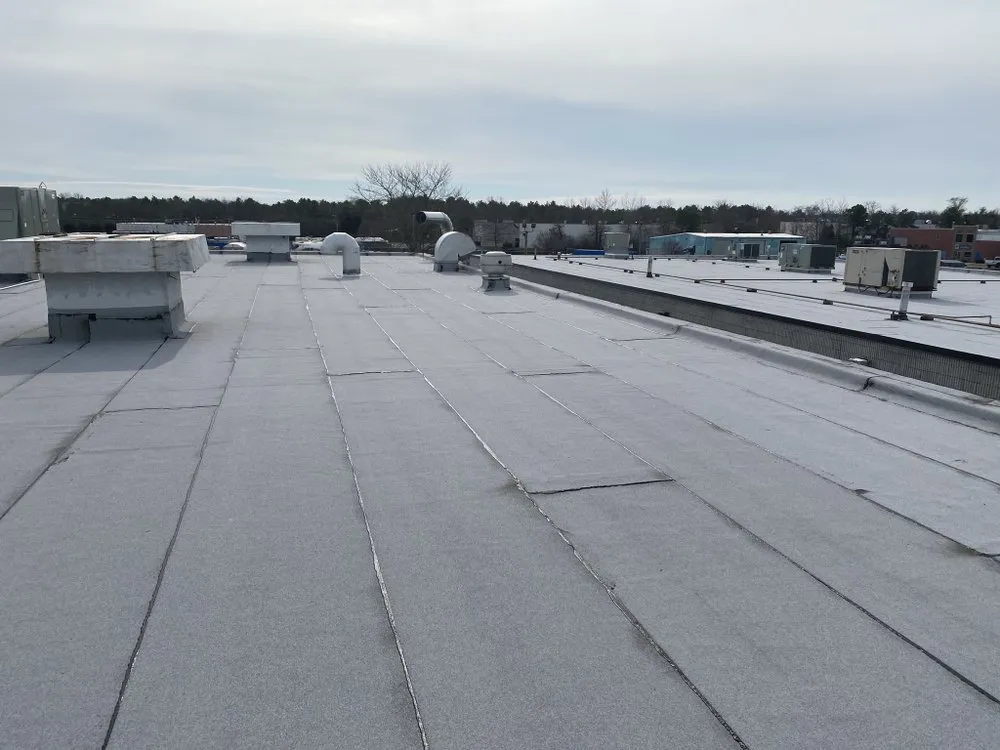 Trusted flat roof repair in Amityville, CT by Commercial Roofing Solutions