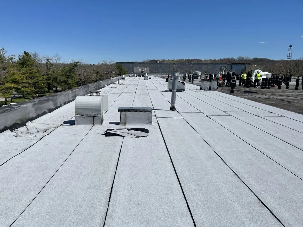 Professional shingle roofing service experts serving Amityville, CT - Commercial Roofing Solutions