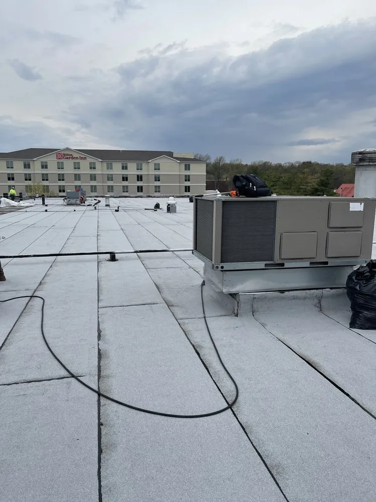 Professional shingle roofing service in Amityville, CT by Commercial Roofing Solutions