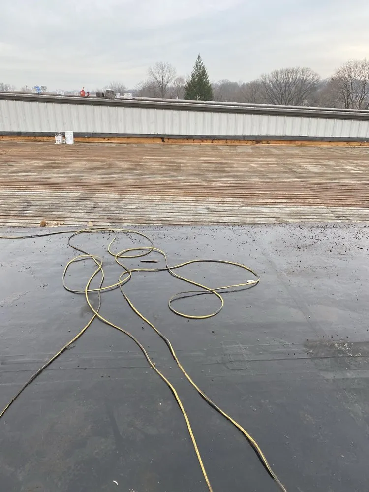 Licensed roof repair experts serving Amityville, CT - Commercial Roofing Solutions