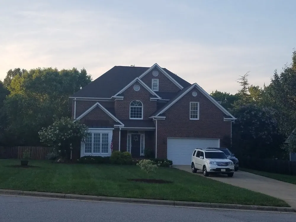 Slide of Compass Roofing and Renovations