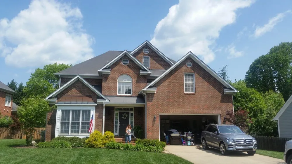 Slide of Compass Roofing and Renovations