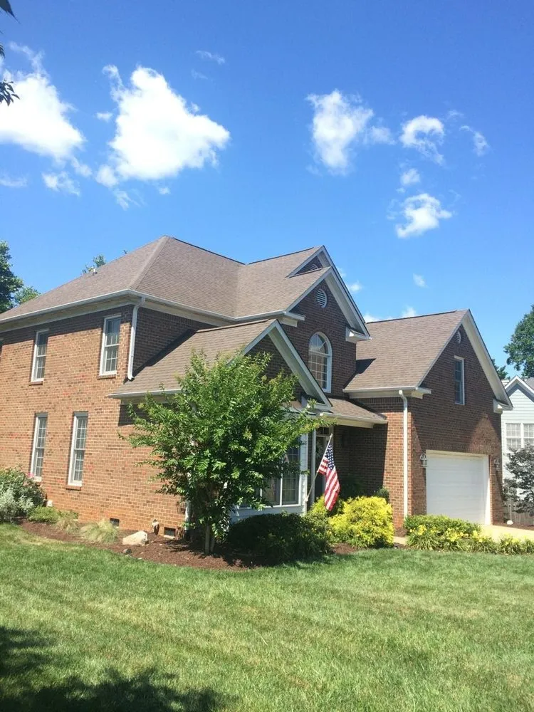 Slide of Compass Roofing and Renovations