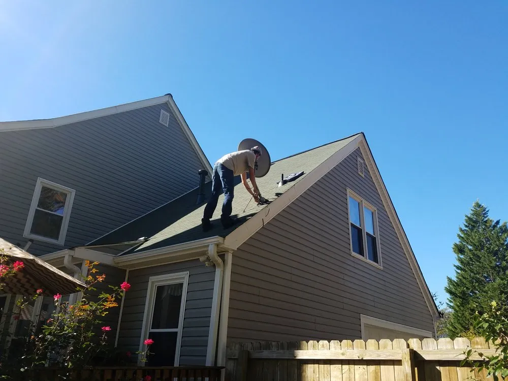 Slide of Compass Roofing and Renovations