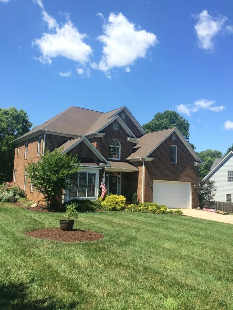 Slide of Compass Roofing and Renovations