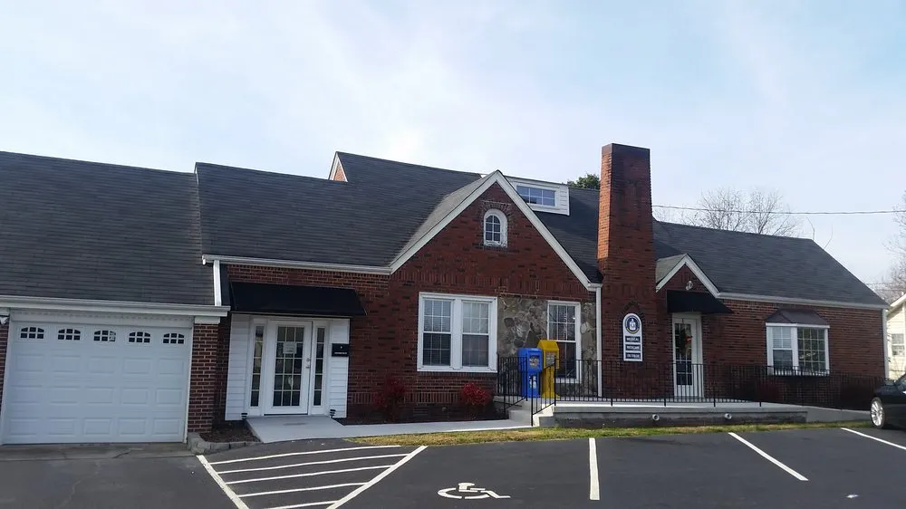 Slide of Compass Roofing and Renovations