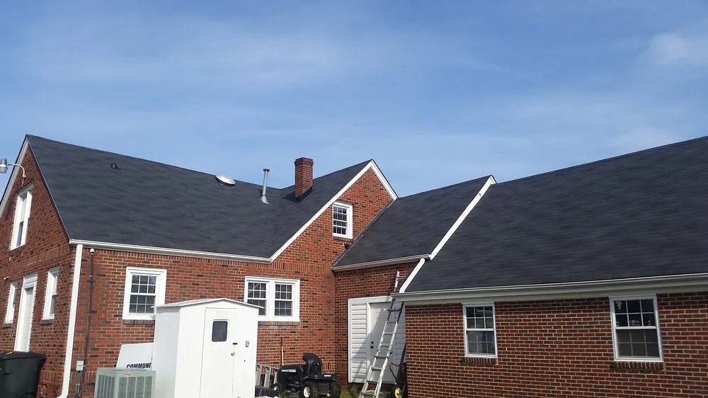 Slide of Compass Roofing and Renovations