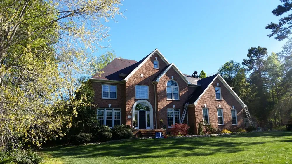 Slide of Compass Roofing and Renovations