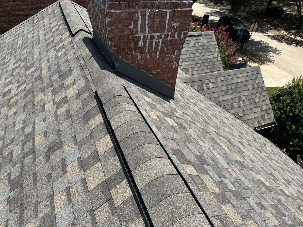 Slide of Compass Roofing