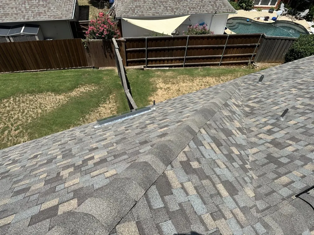 Slide of Compass Roofing