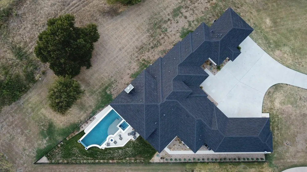 Slide of Compass Roofing