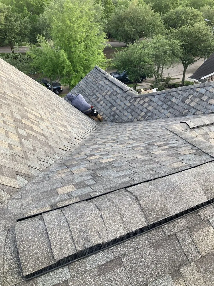 Slide of Compass Roofing