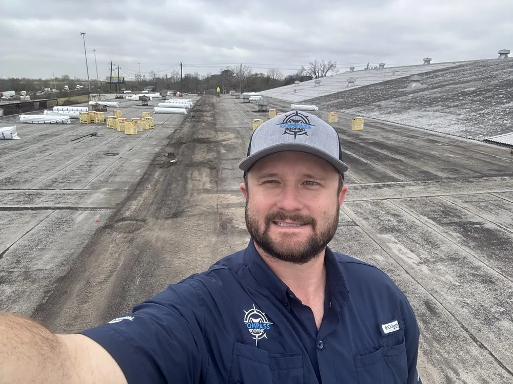 Slide of Compass Roofing