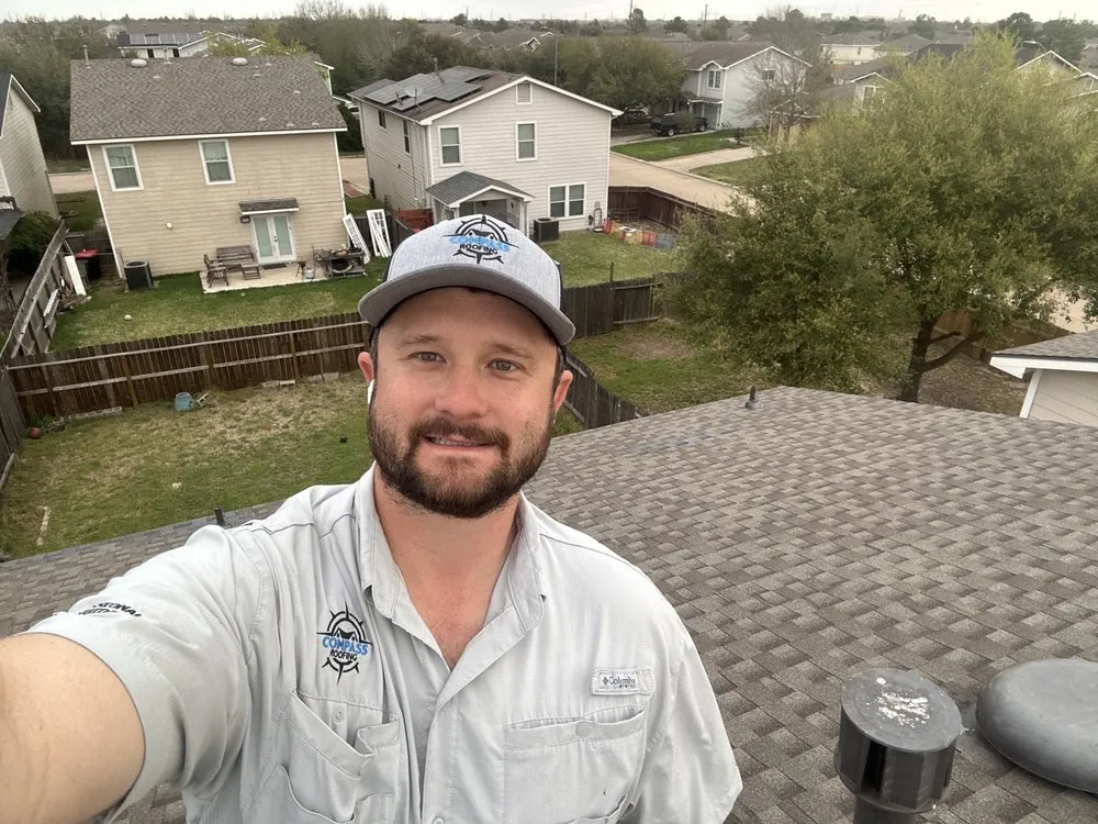 Slide of Compass Roofing