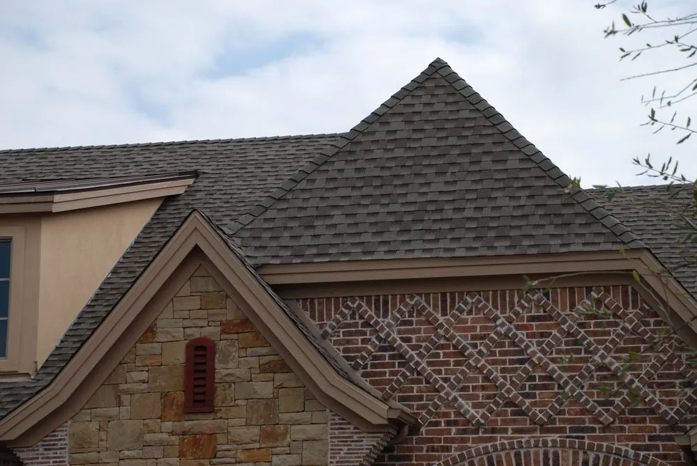 Slide of Compass Roofing