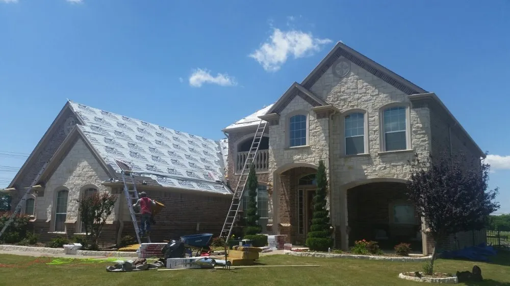 Slide of Compass Roofing