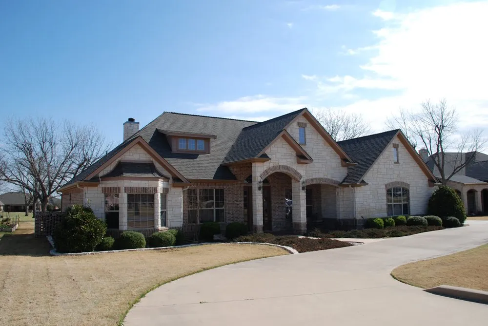 Slide of Compass Roofing