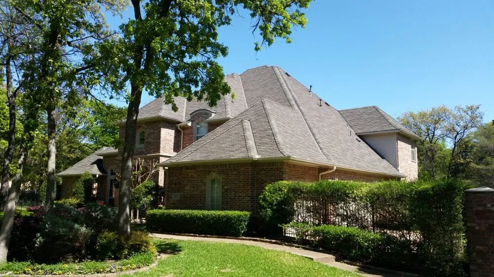 Slide of Compass Roofing