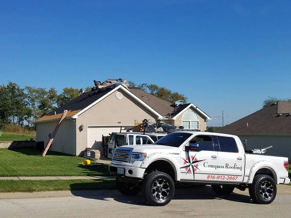 Slide of Compass Roofing