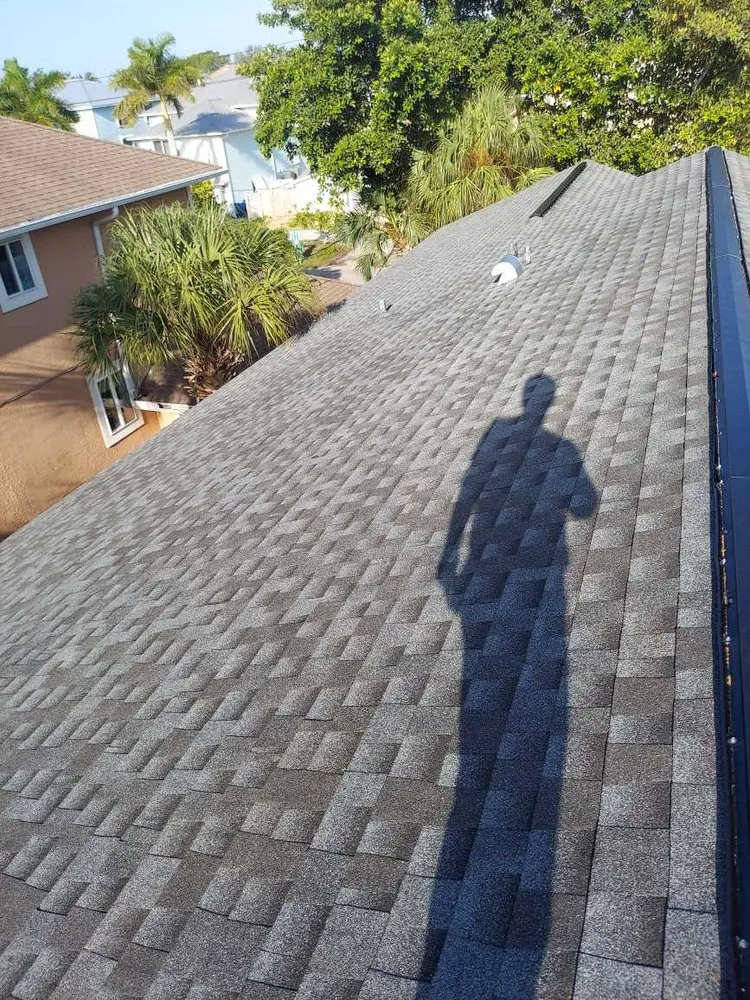 Slide of Compass Roofing Services