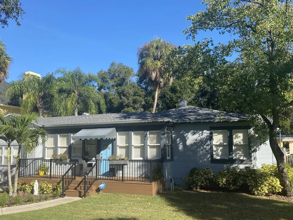 Slide of Compass Roofing Services