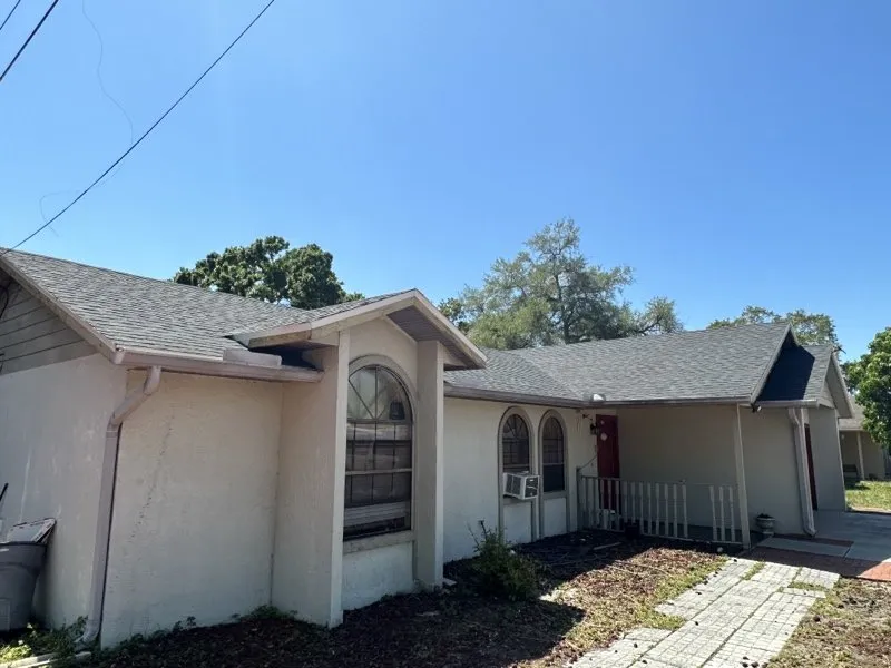 Slide of Compass Roofing Services