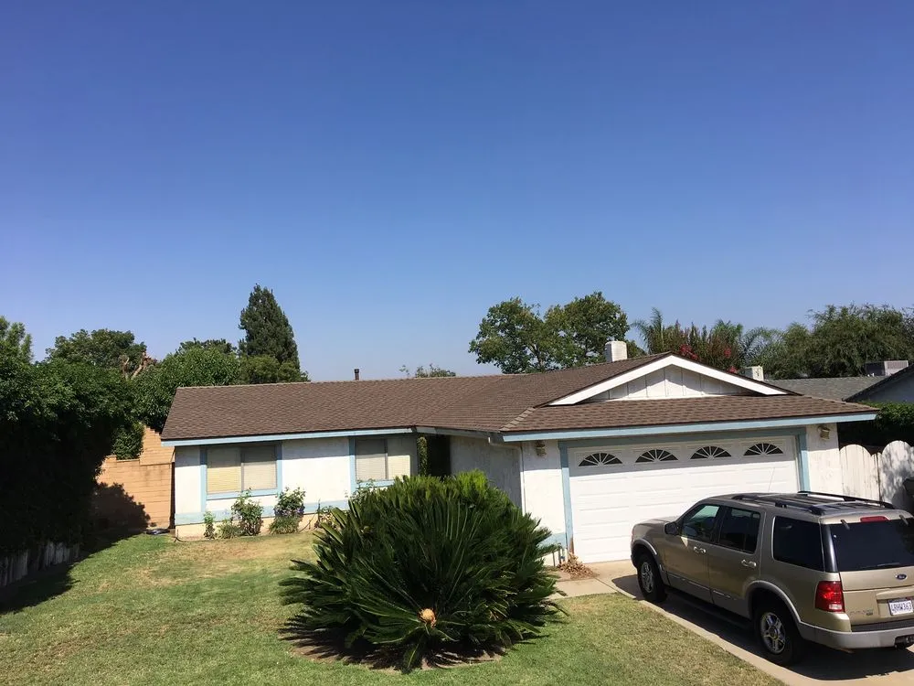 Slide of Competition Roofing