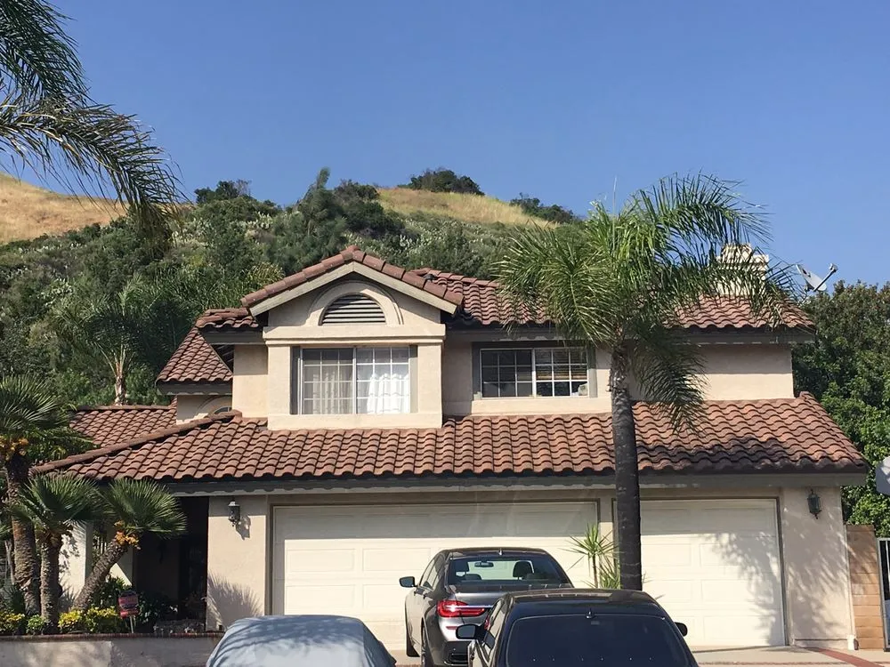 Slide of Competition Roofing