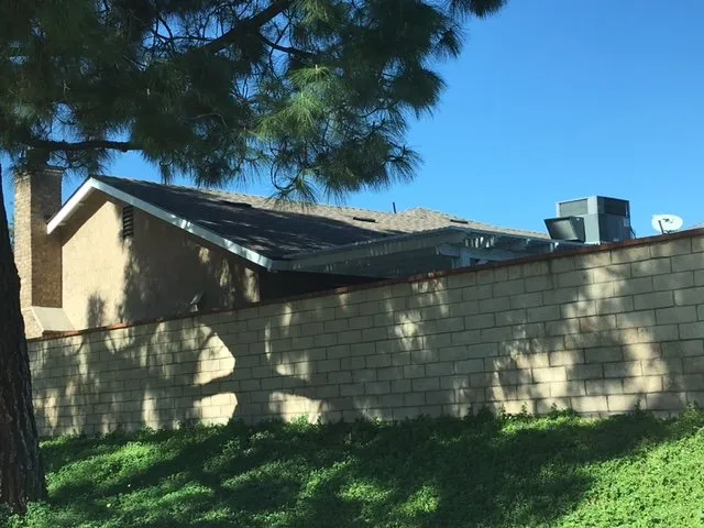 Slide of Competition Roofing