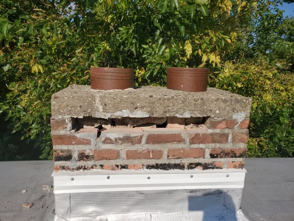 Slide of Competitive Shingle & Flat Roofing