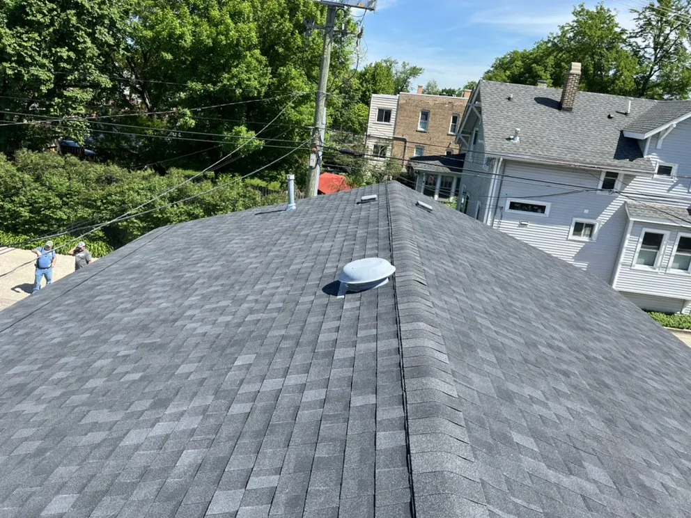 Slide of Competitive Shingle & Flat Roofing
