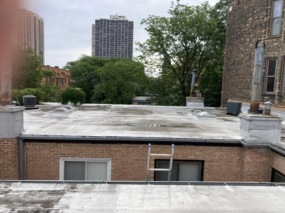 Slide of Competitive Shingle & Flat Roofing