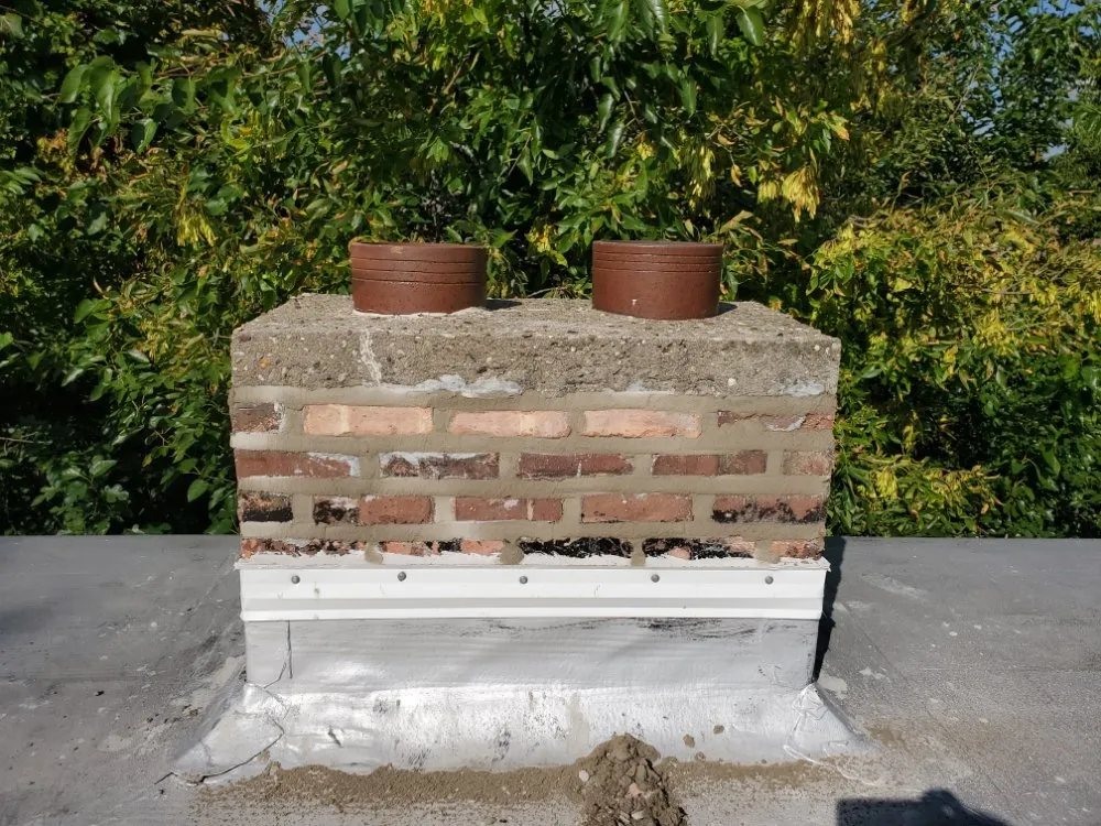 Slide of Competitive Shingle & Flat Roofing