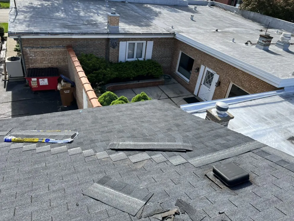 Slide of Competitive Shingle & Flat Roofing