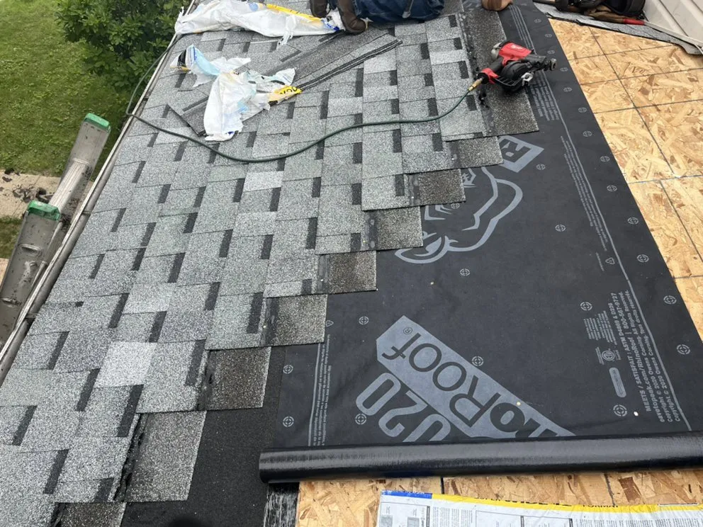 Slide of Competitive Shingle & Flat Roofing