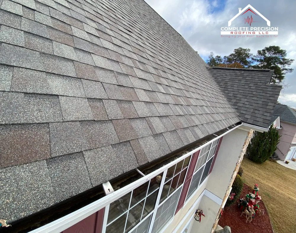 Slide of Complete Precision Roofing