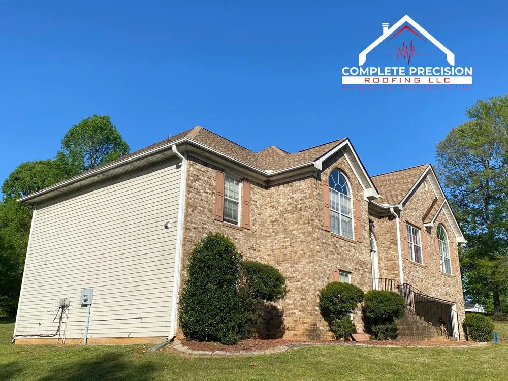 Slide of Complete Precision Roofing