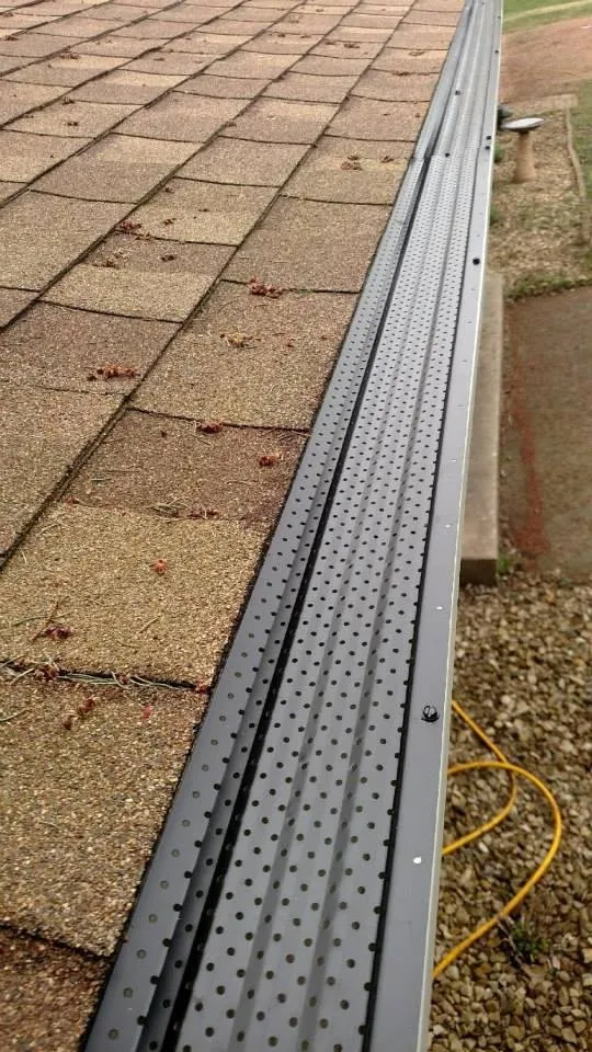 Slide of Comstock Seamless Rain Gutters